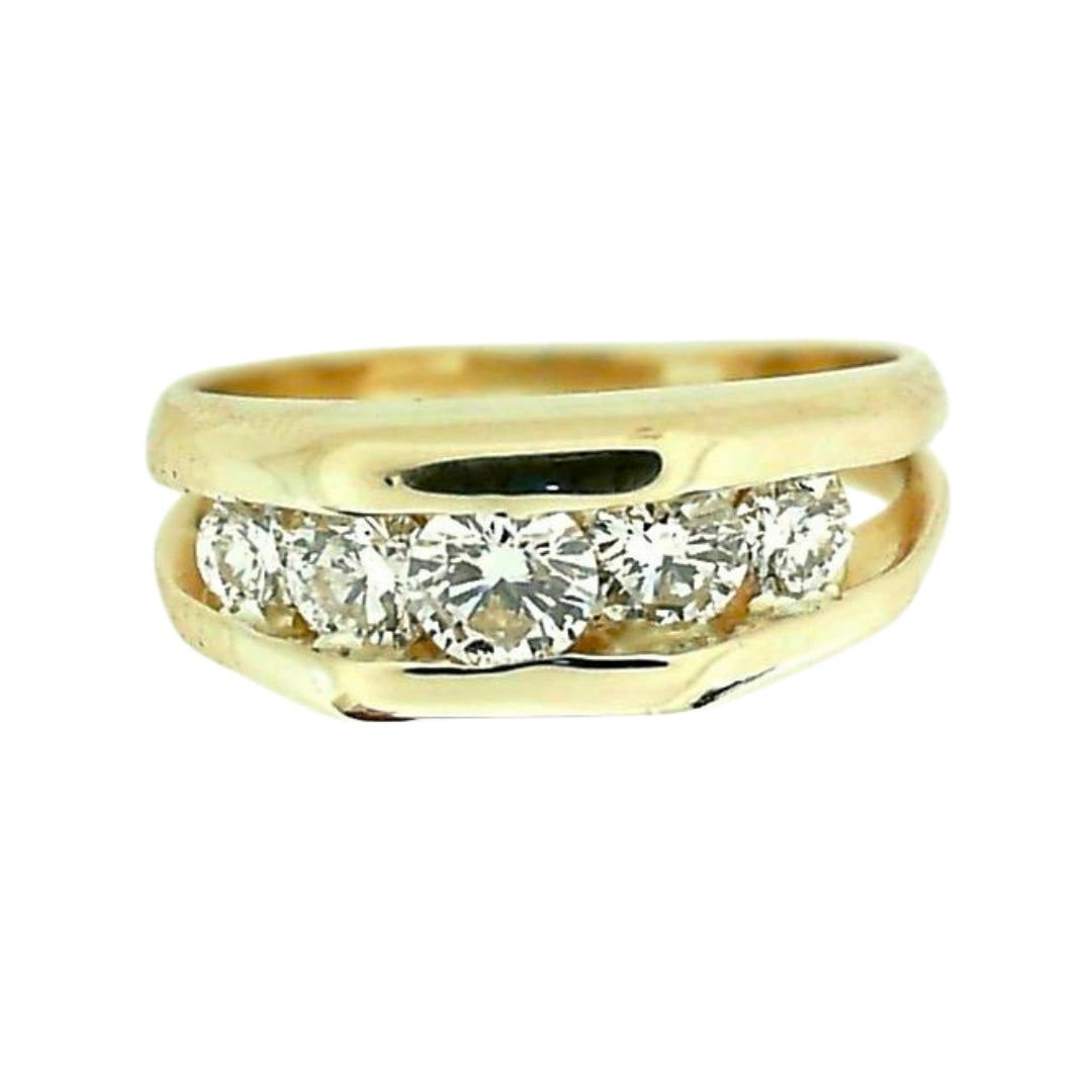 Yellow gold ring channel set with 5 brilliant round diamonds.