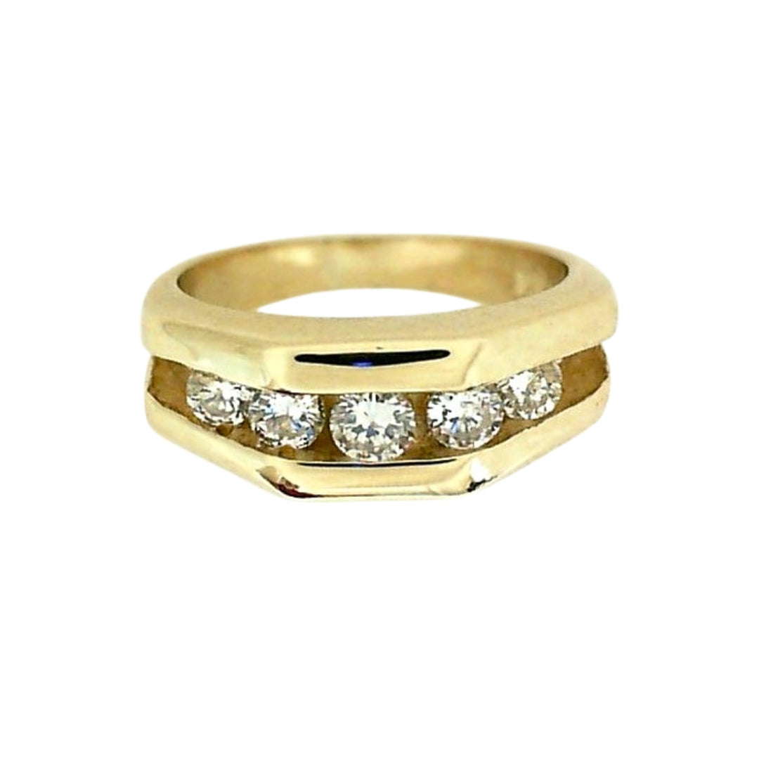 Yellow gold ring channel set with 5 brilliant round diamonds.