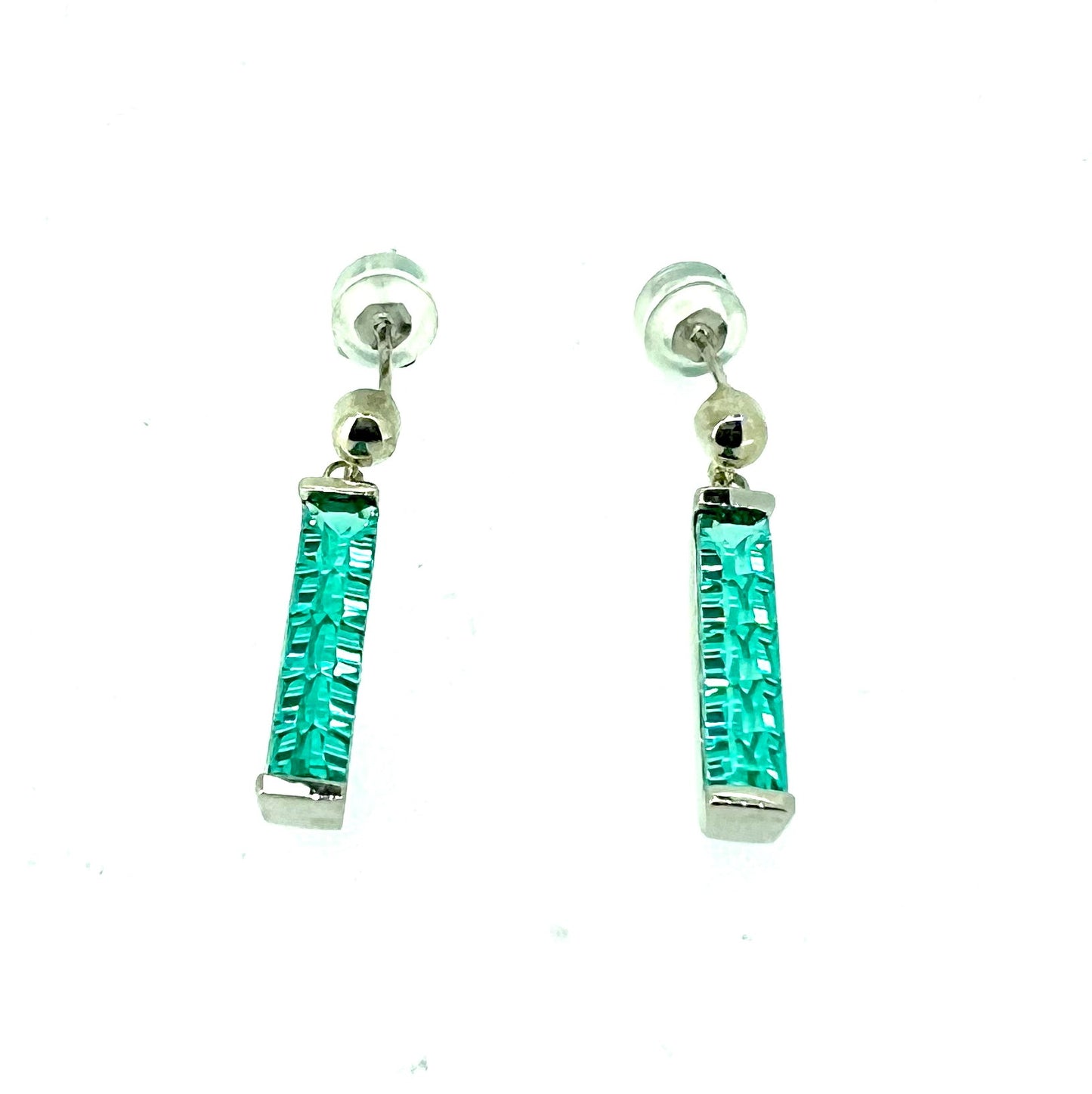 White sterling silver drop earrings with vibrant green paraiba stones.