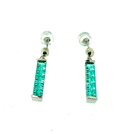 White sterling silver drop earrings with vibrant green paraiba stones.