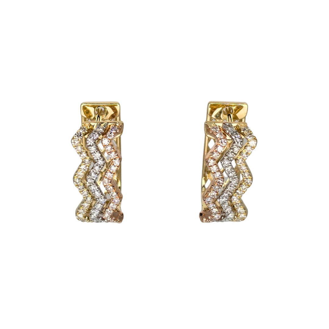 Front view of tri-color gold diamond hoop earrings arranged in a triple zigzag design.