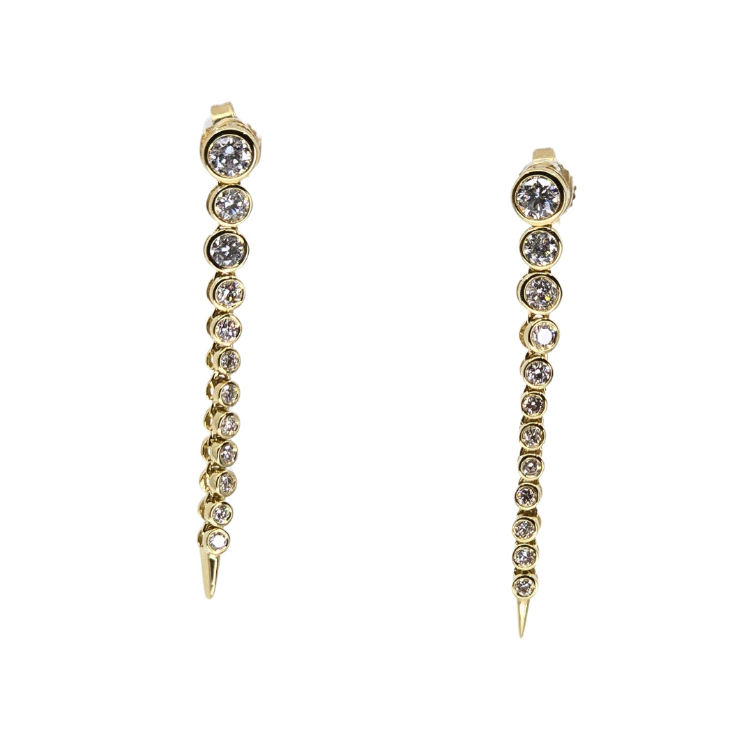 Yellow gold drop earrings with descending bezel set diamond "bubbles."