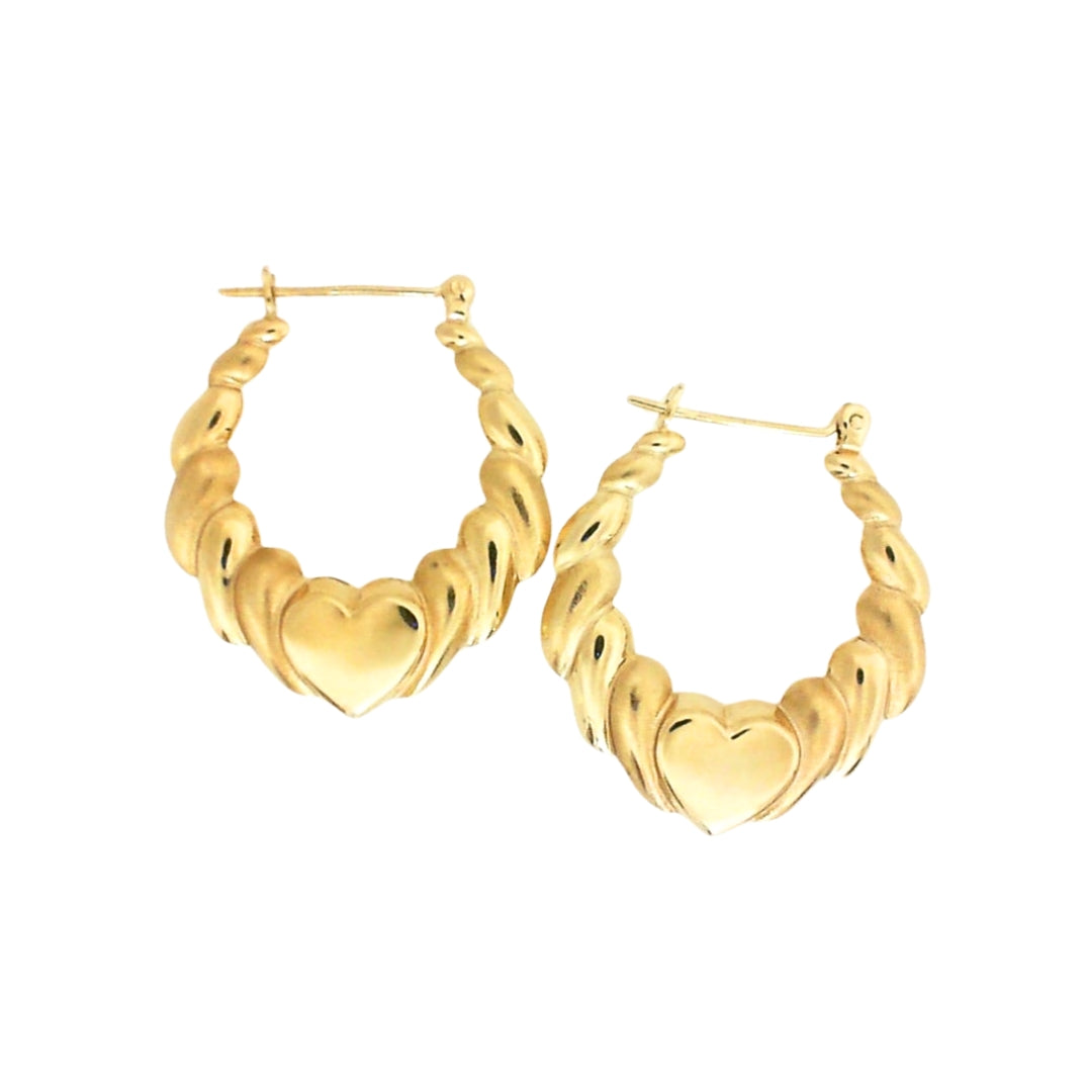 Gold hoop earrings with graduated heart design in middle.