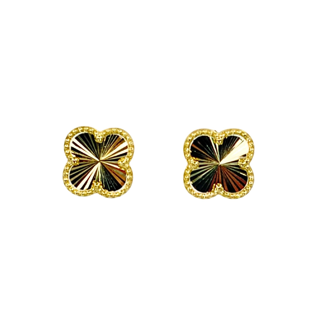 Brilliant yellow gold quatrefoil post earrings with a fantasy cut design.