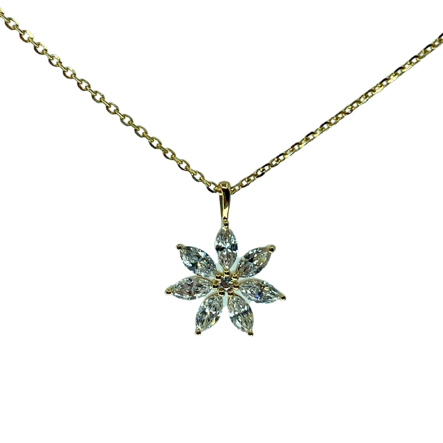 A yellow gold pendant with a flower design, adorned with marquise-cut diamonds, accompanied by an 18-inch gold chain.