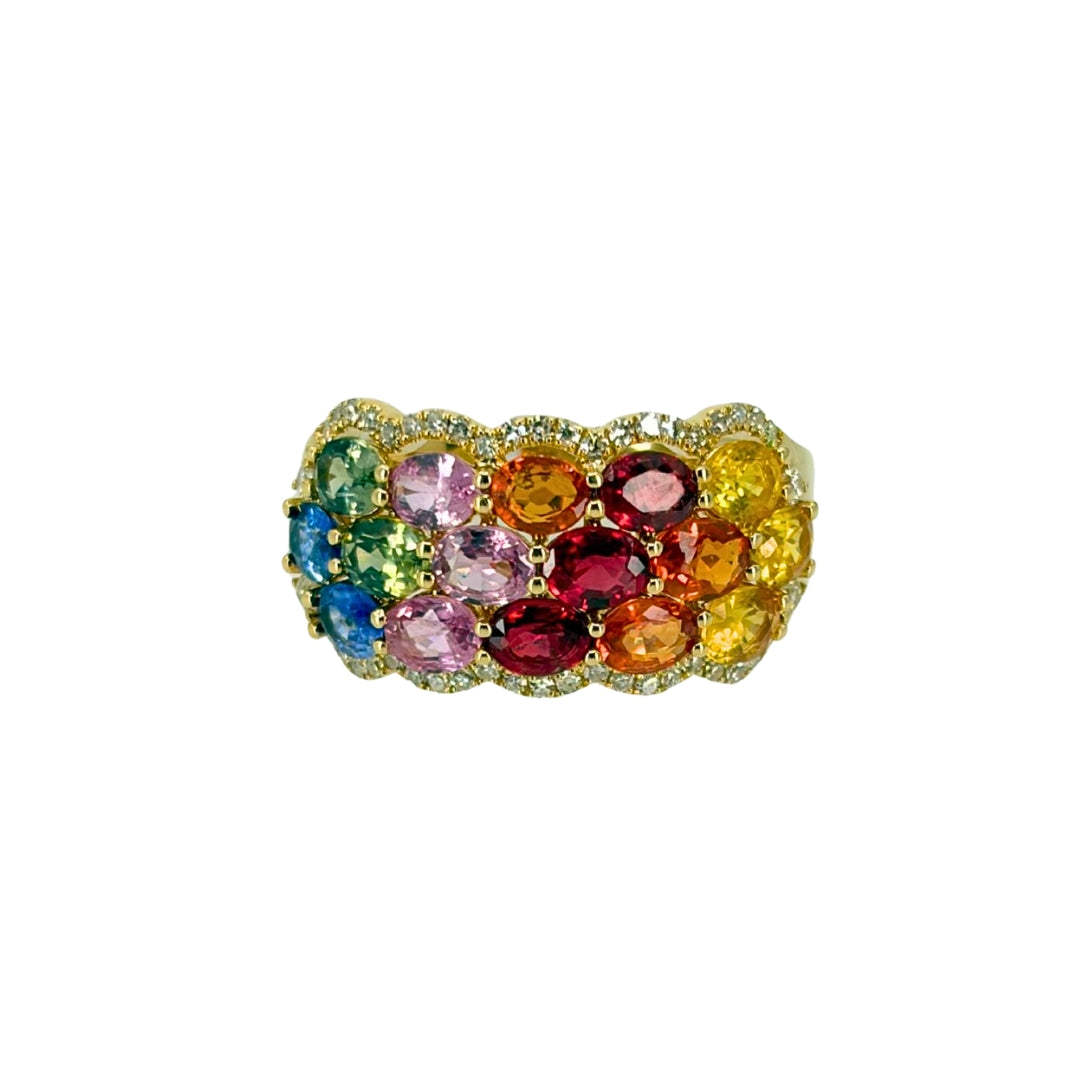 Yellow gold band set with three rows of multicolor sapphires in blue, green, pink, red, orange, and yellow from left to right and outlined with round diamonds.