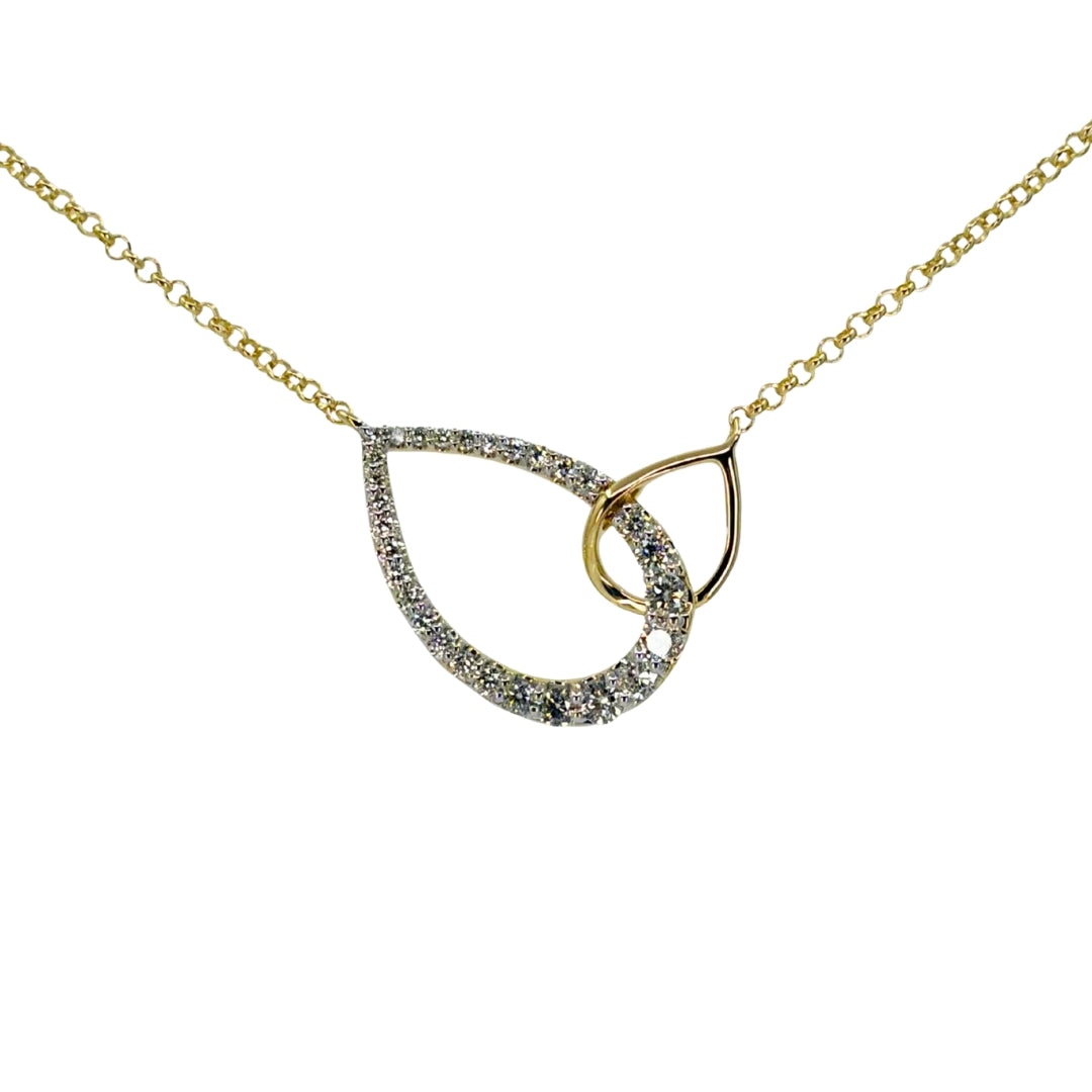 Yellow gold necklace with two interlocking open pear shapes. The larger left pear is adorned with sparkling round diamonds.