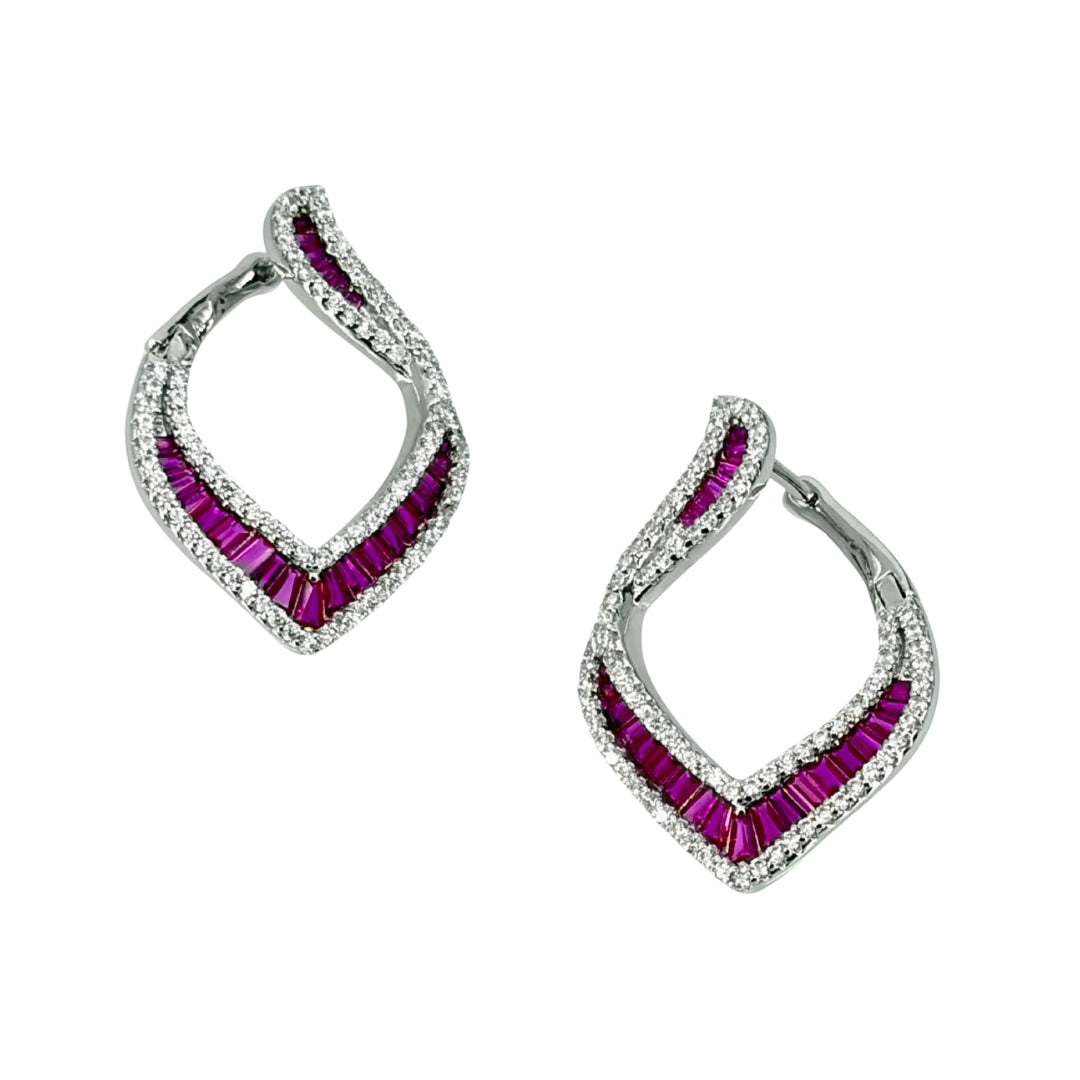 Large flowing silver hoop earrings with centering red baguette cz stones accented on both sides by round cz stones.