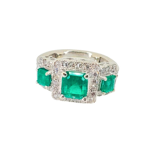 White Gold Three Emerald Cut Emerald and Diamond Ring