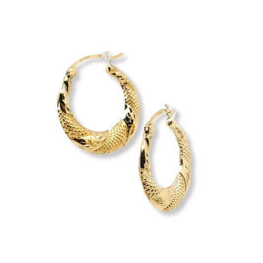 Yellow gold hoop earrings with an intricately textured design on a white background.