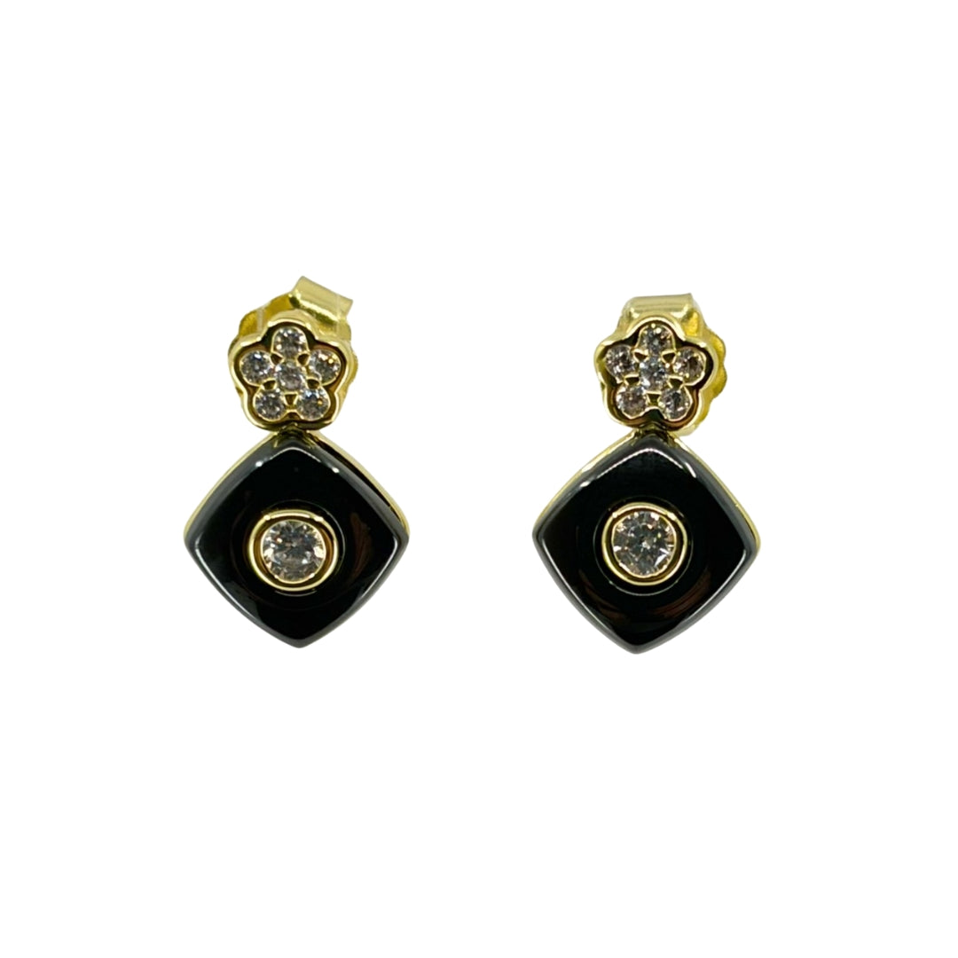 Stylish yellow silver earrings featuring a black square drop with bezel set cz and decorative floral stud accents.