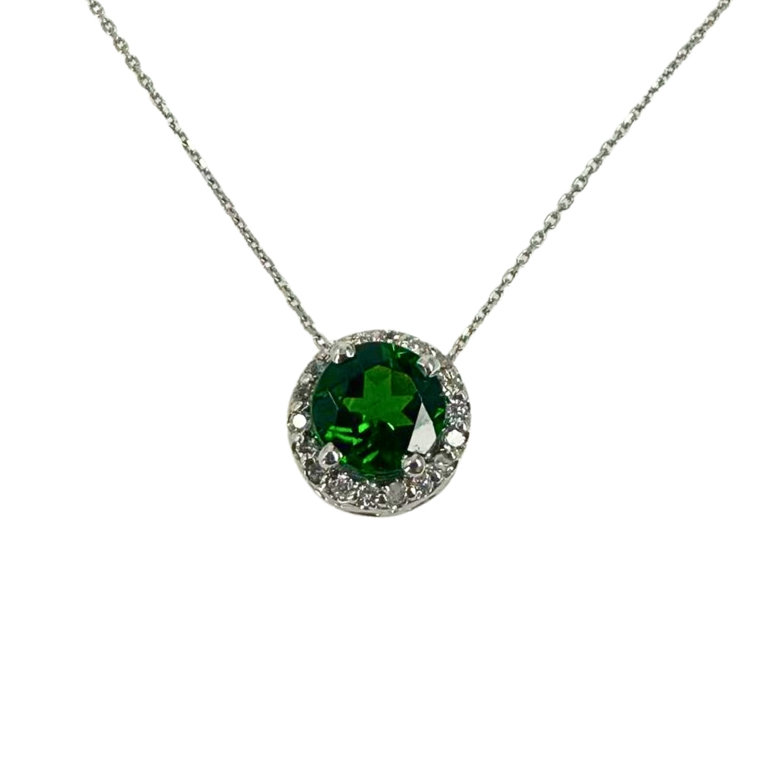 14 karat white gold slide pendant featuring a round chrome diopside accented by 18 round diamonds totaling in a classic elegant setting.