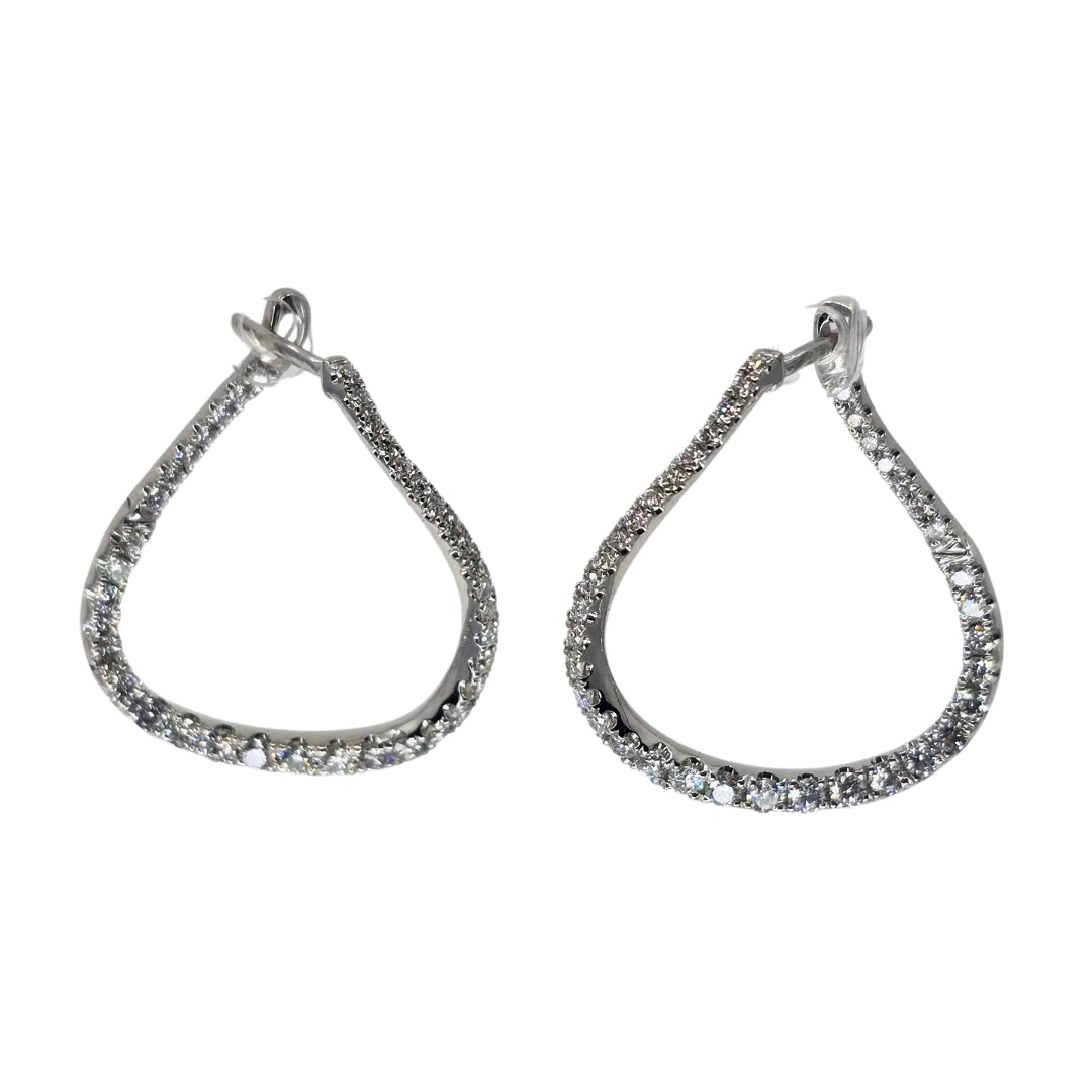 Diamond hoop earrings with a flat twisted design crafted from white gold.
