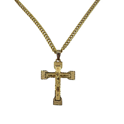Yellow gold crucifix pendant on a yellow gold Cuban chain.