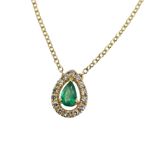 Pear shaped emerald station necklace with round diamond halo set in white gold.