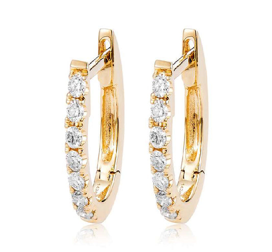Yellow gold hoop earrings set with shimmering round diamonds.