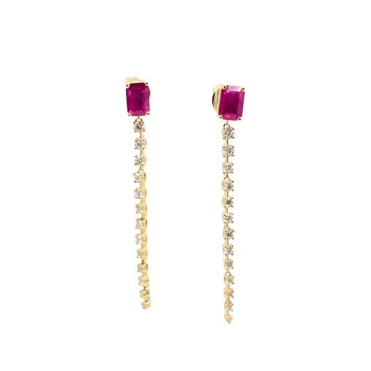 Yellow gold earrings with emerald cut rubies and descending links of round diamonds.