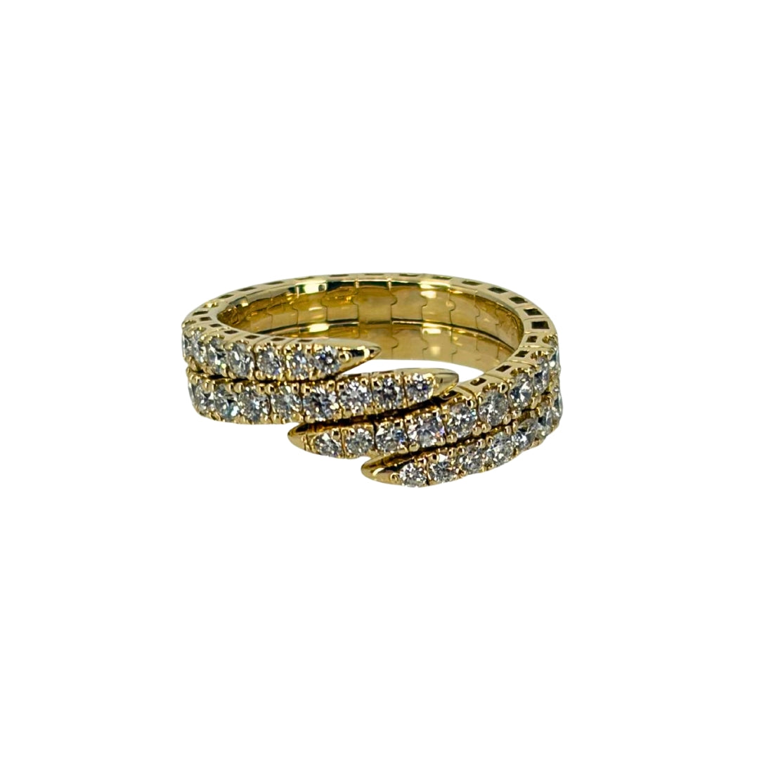 Yellow gold ring with two wrapping bands of round diamonds in a flowing bypass design.