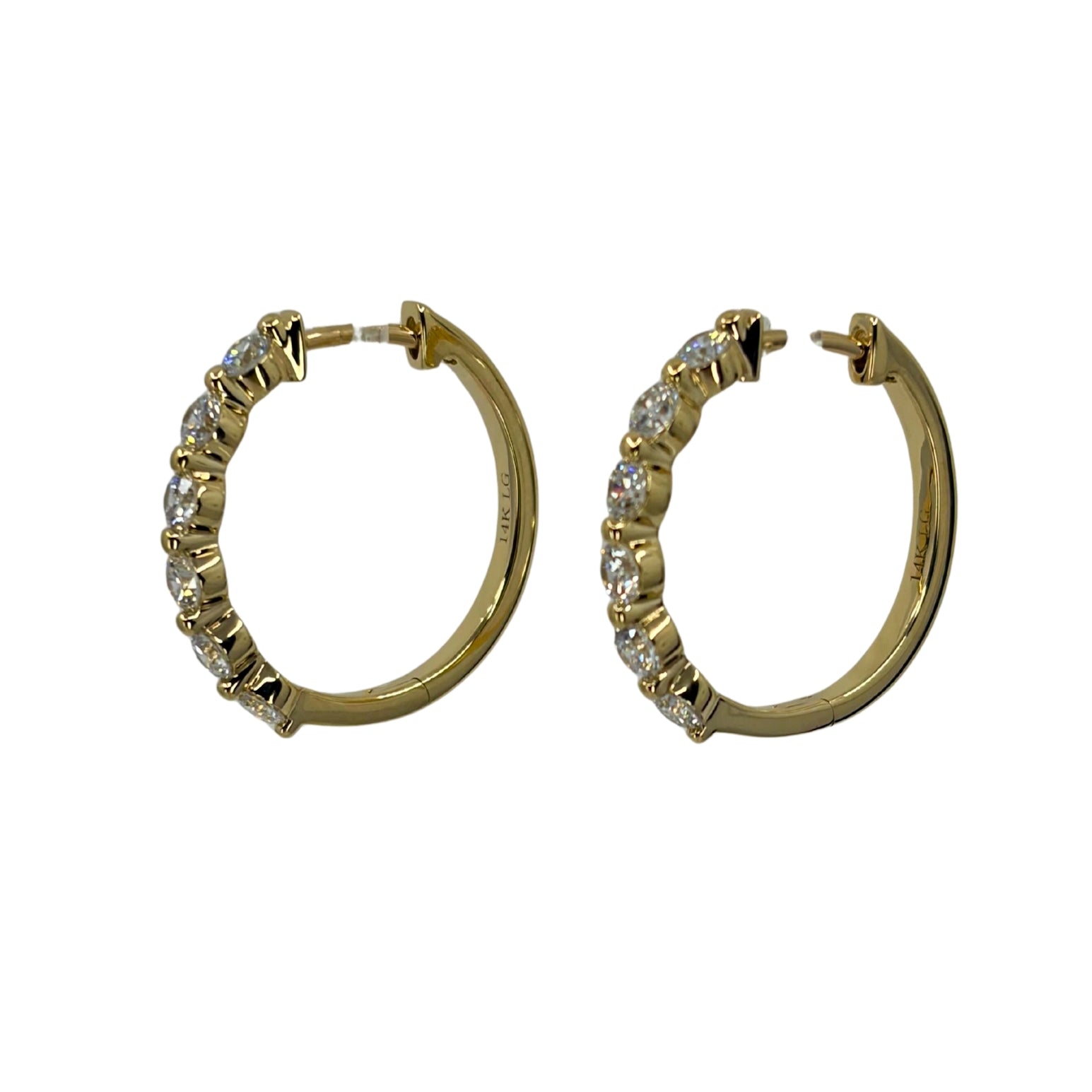 Yellow gold hoop earrings set with 6 lab diamonds each and a secure clicking clasp.