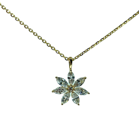 A yellow gold pendant with a flower design, adorned with marquise-cut diamonds, accompanied by an 18-inch gold chain.