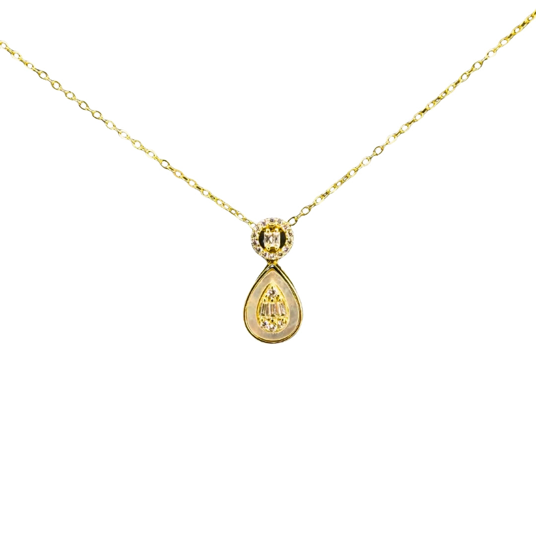 Yellow  silver drop necklace featuring a pear-shaped mother-of-pearl inlay accented with sparkling baguette and round cubic zirconia stones.
