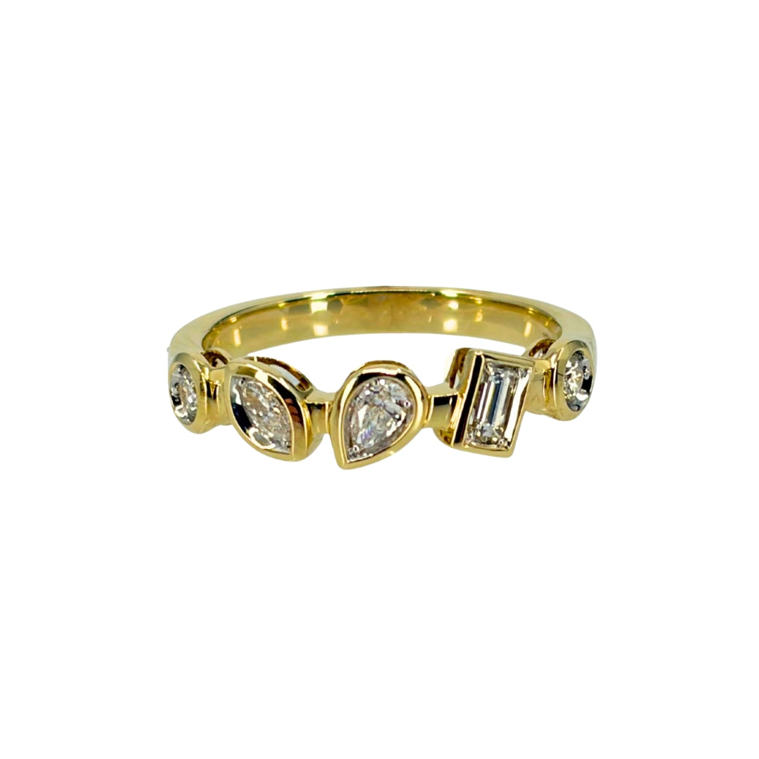 Yellow gold ring set with diamonds in multiple shapes including marquise, pear, and round.
