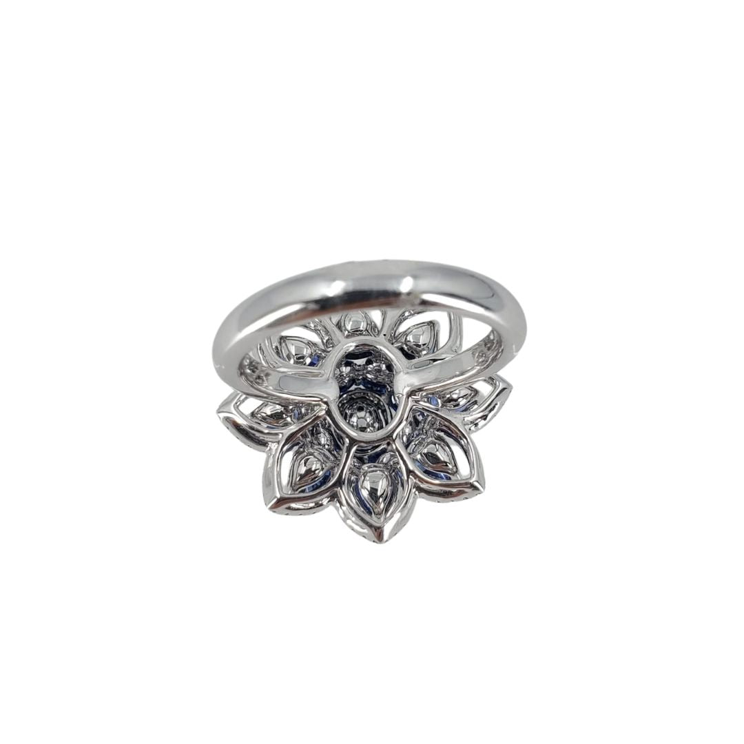 Back of white gold sapphire and diamond flower ring