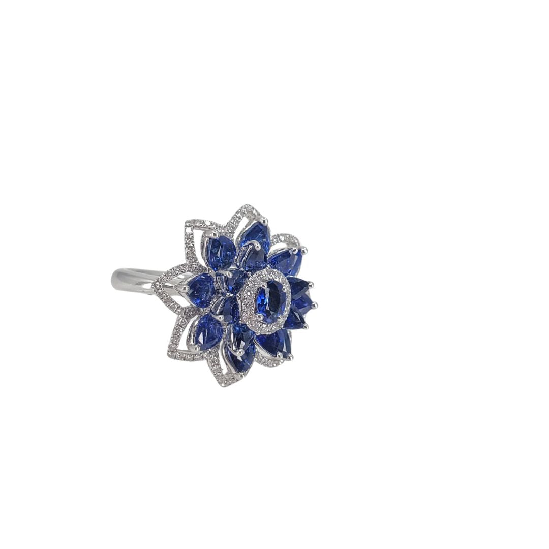 Side view of white gold sapphire and diamond flower ring