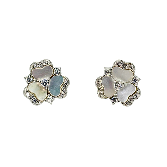 White silver stud earrings set with overlapping mother of pearl and cz petals in a button flower shape.
