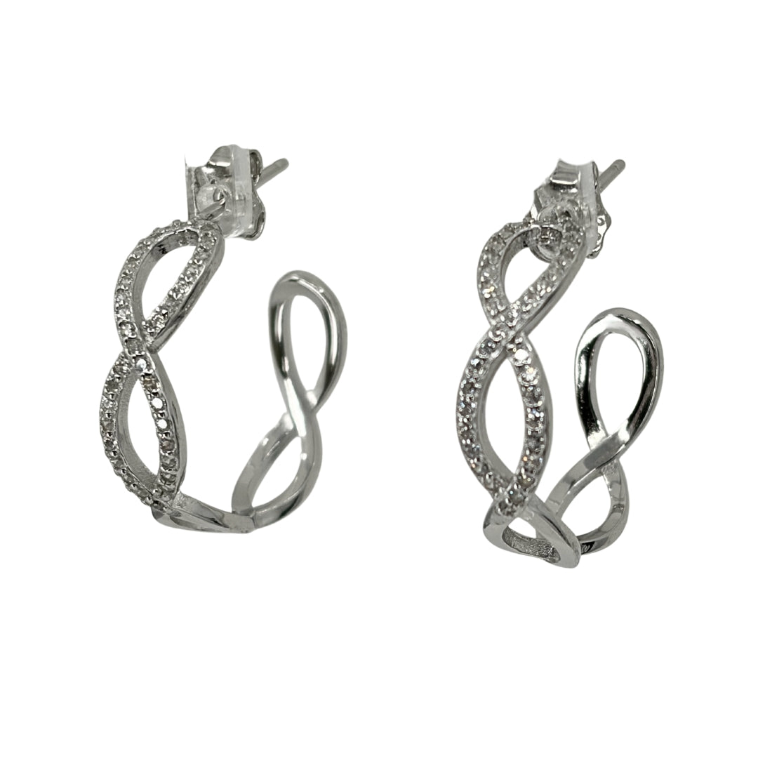 White silver hoop earrings shaped in a repeating infinity shape and set with pave cubic zirconia stones.
