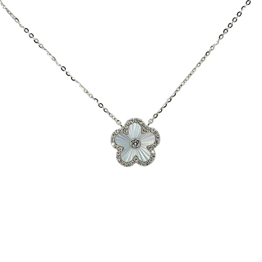White silver necklace with a small quatrefoil pendant set with lustrous mother of pearl outlined with cz stones.