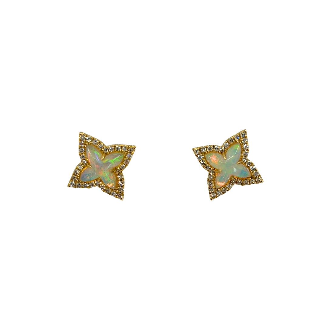 Yellow gold star shaped earrings set with center fantasy cut opals haloed by shimmering round diamonds.