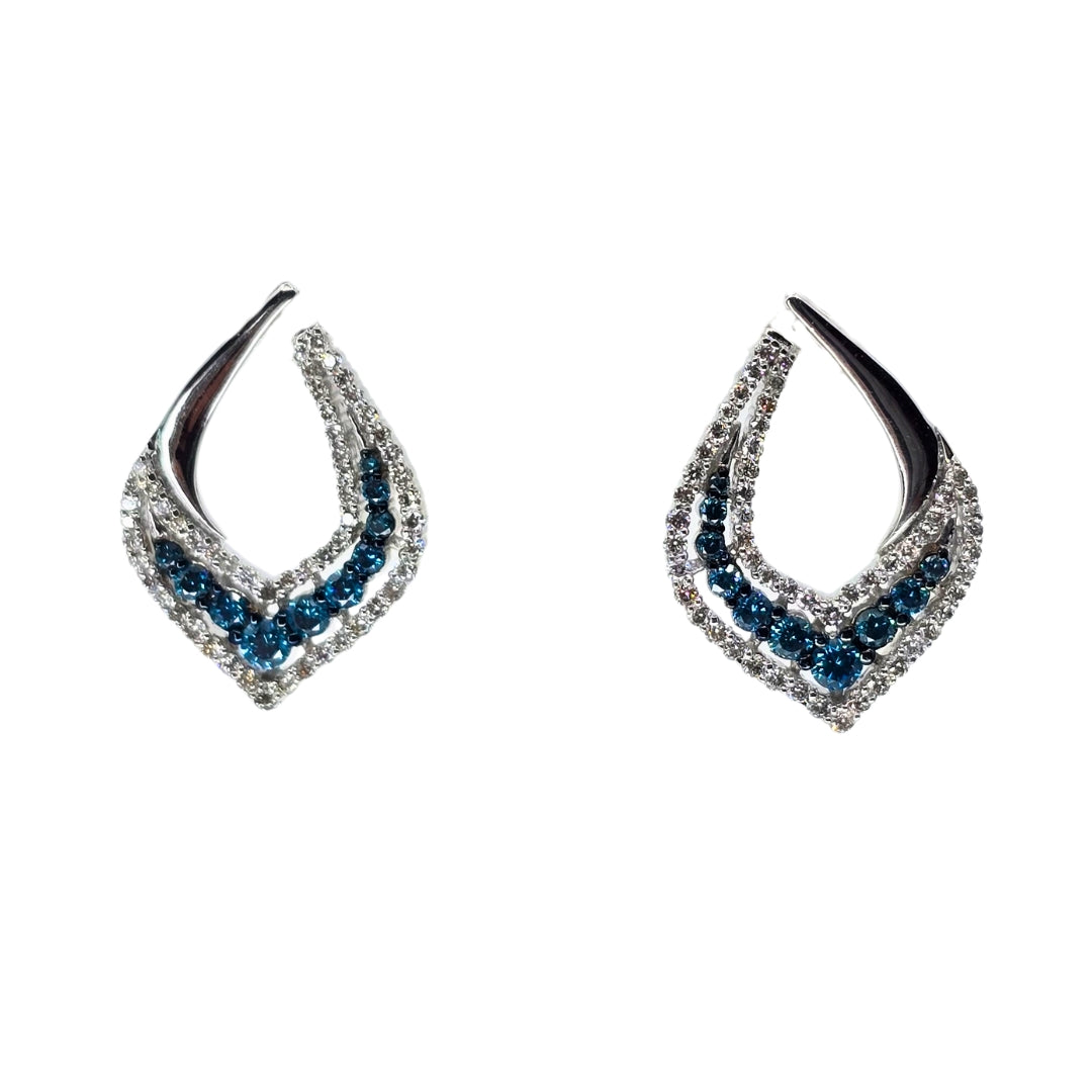 White gold earrings set with bright blue and white diamonds.