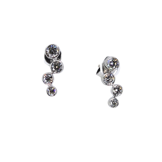 Earrings with descending bezel set diamond "bubbles" set in white gold.