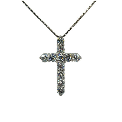 White gold cross pendant with 11 lab grown diamonds suspended from a white gold box chain.
