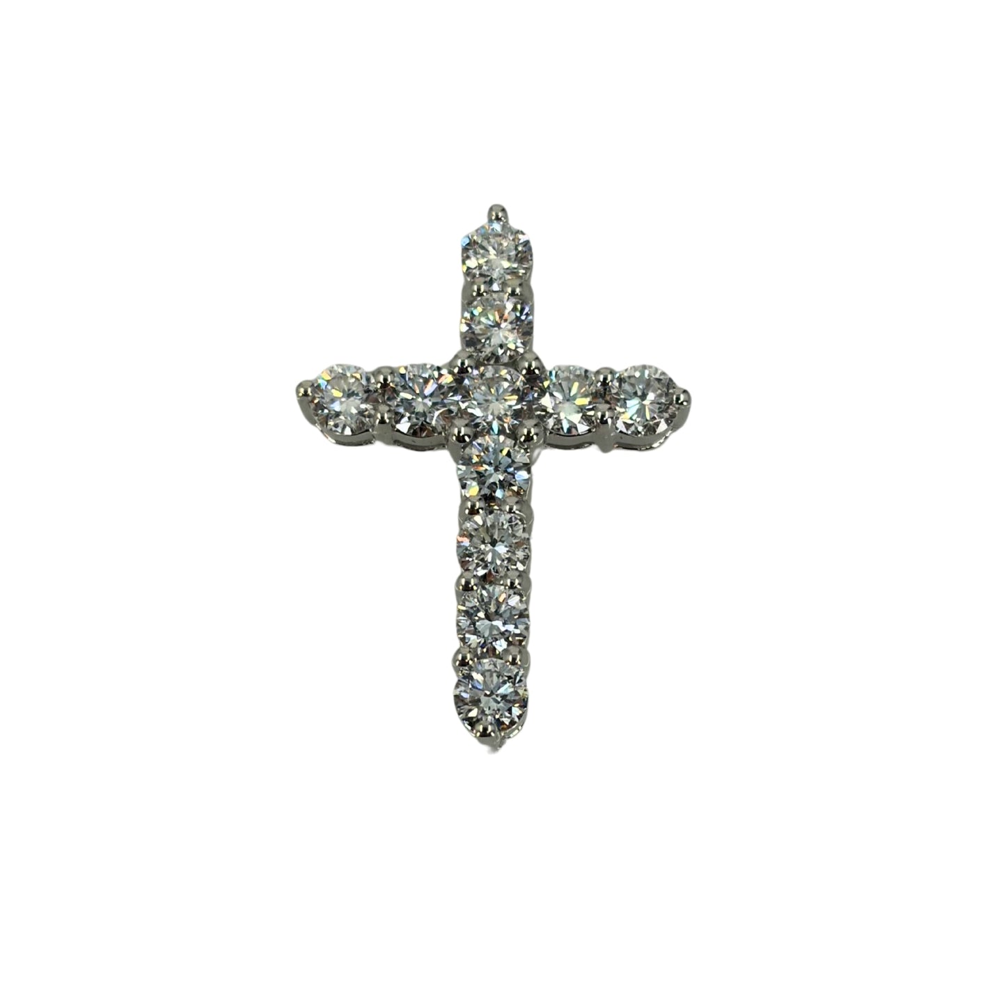 White gold cross pendant set with 11 shimmering round lab grown diamonds that make up the cross.